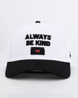 White cap with black text 'Always Be Kind'