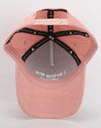Pink cap with black mesh back on a white background