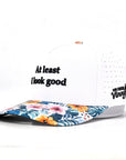 At Least I Look Good laser cut golf hat with tropical hibiscus floral brim