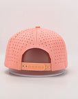 Pink baseball cap with perforated design rear