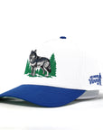 Cap with wolf design and text on a white background