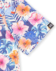 Close-up of the Our Friend Vinny tag on the sleeve of the Birdies in Bloom golf polo