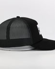 Black mesh cap on a white background