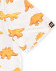 Close-up of the Our Friend Vinny tag on the sleeve of the Dino Nugget golf polo