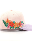 Pink cap with floral embroidery