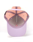 pink and purple cap with flowers