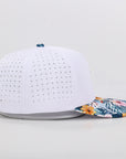 white performance golf cap with floral brim