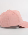 Pink cap on a light gray background