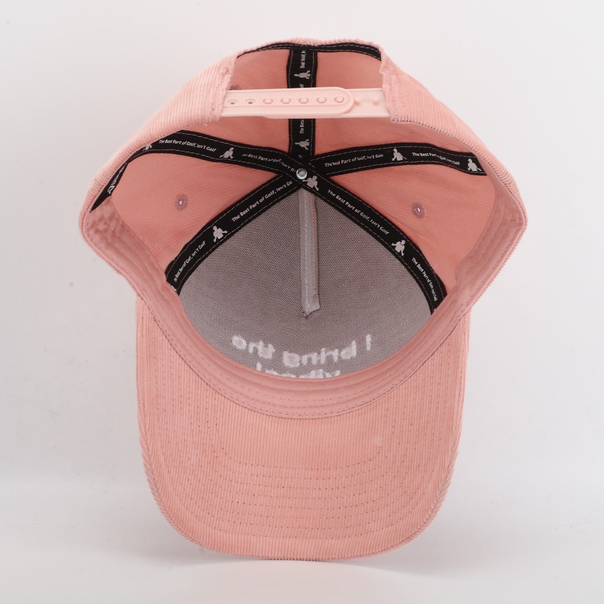 Pink cap with black mesh back on a white background