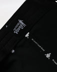 Black jacket with white text and graphics on a white background