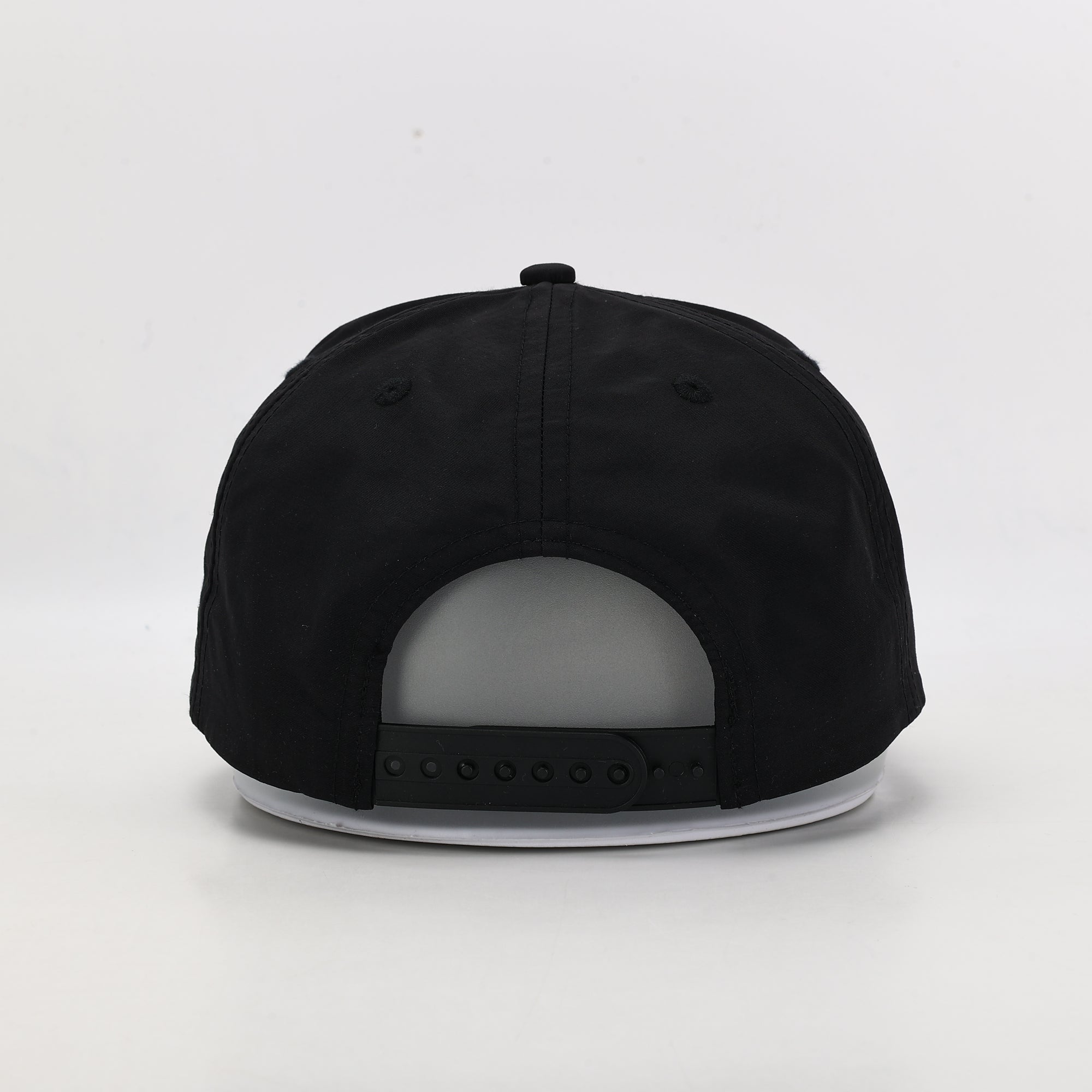 Black cap on a light gray background