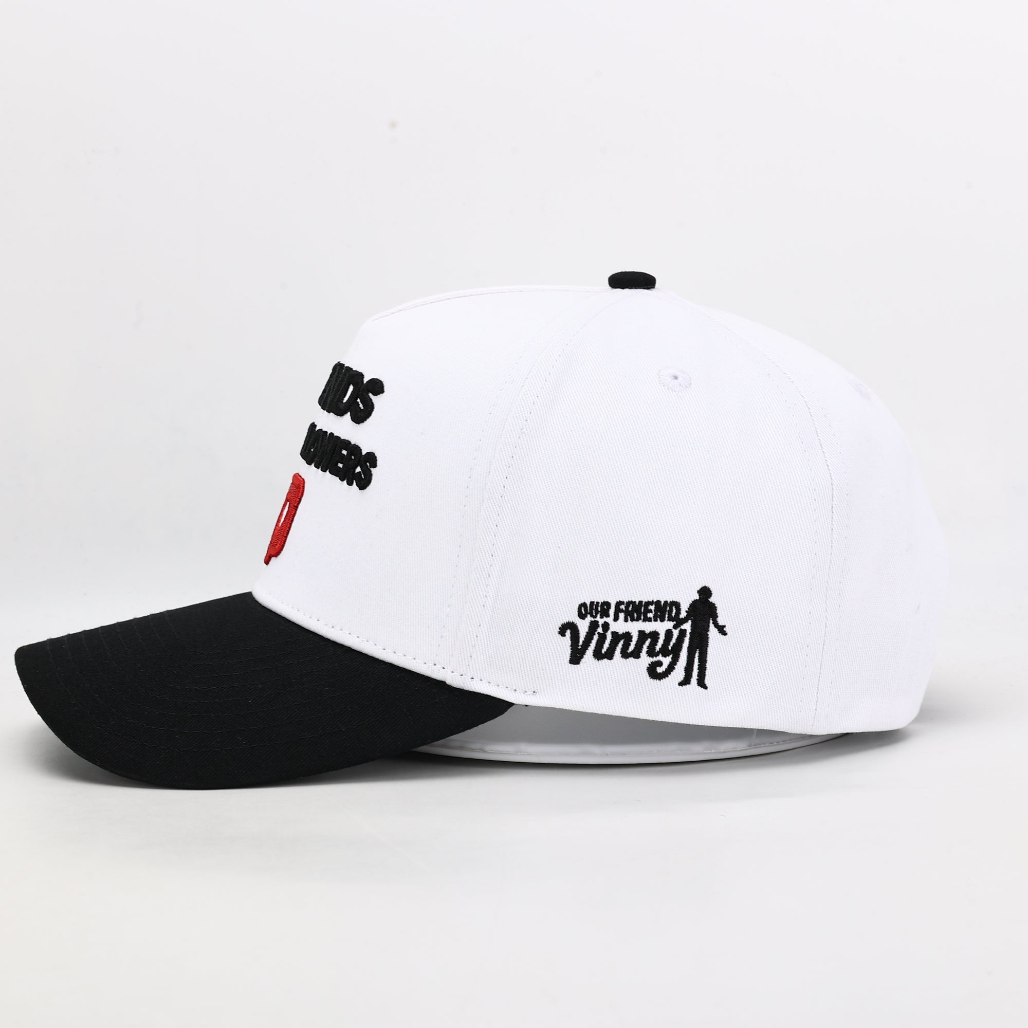 White and black cap with heart logo 