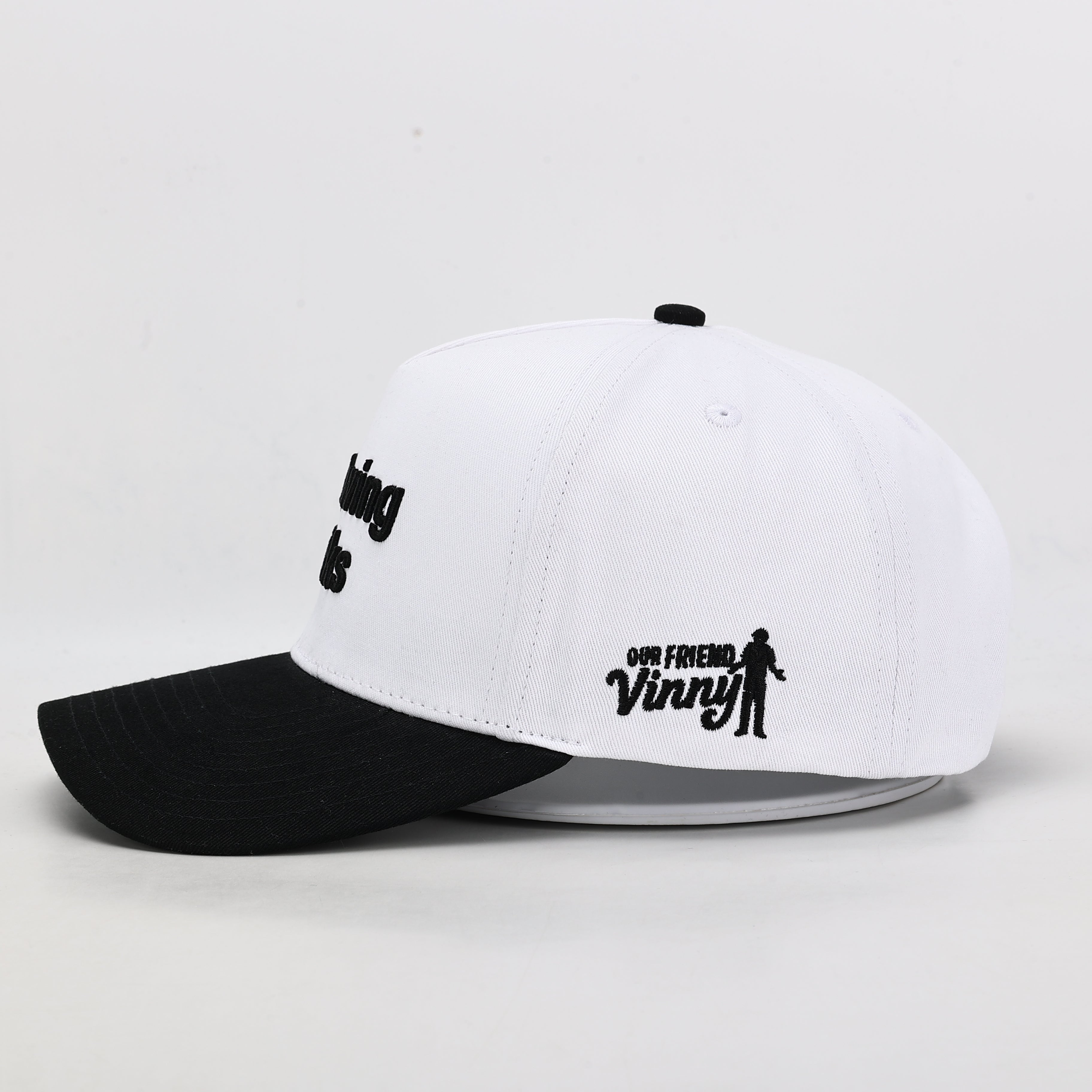 My Swing Sucks Golf Hat – White & Black | Our Friend Vinny
