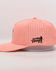 Peach cap with 'Our Friend Vinny' logo on a light gray background