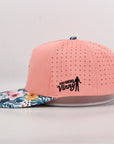 Ventilated Pink cap with floral brim and 'Our Friend Vinny' text on a light gray background