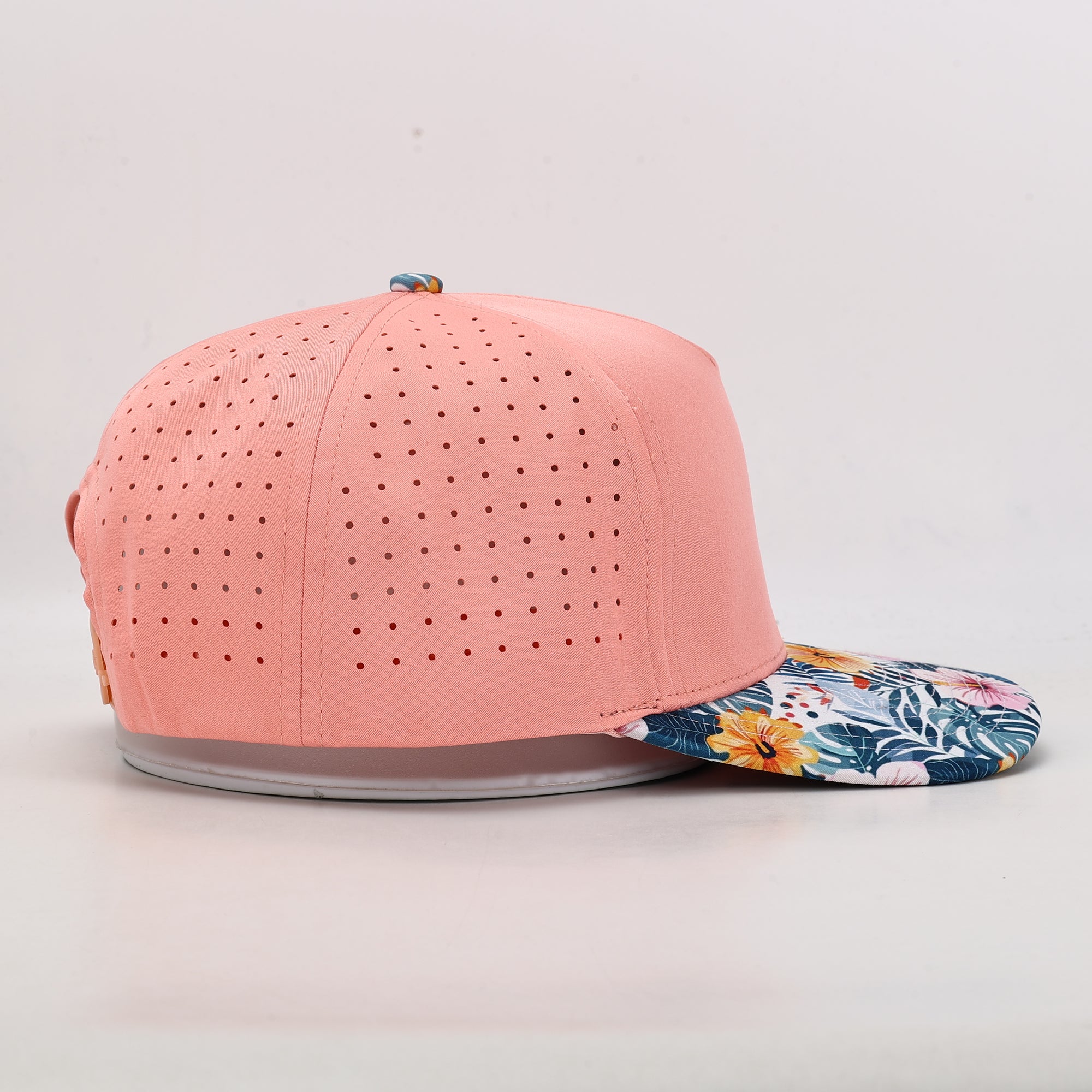 Ventilated pink cap with floral brim 