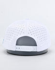 White cap with gray brim on a light gray background