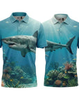 Two polo shirts with shark and underwater scenery designs on a white background