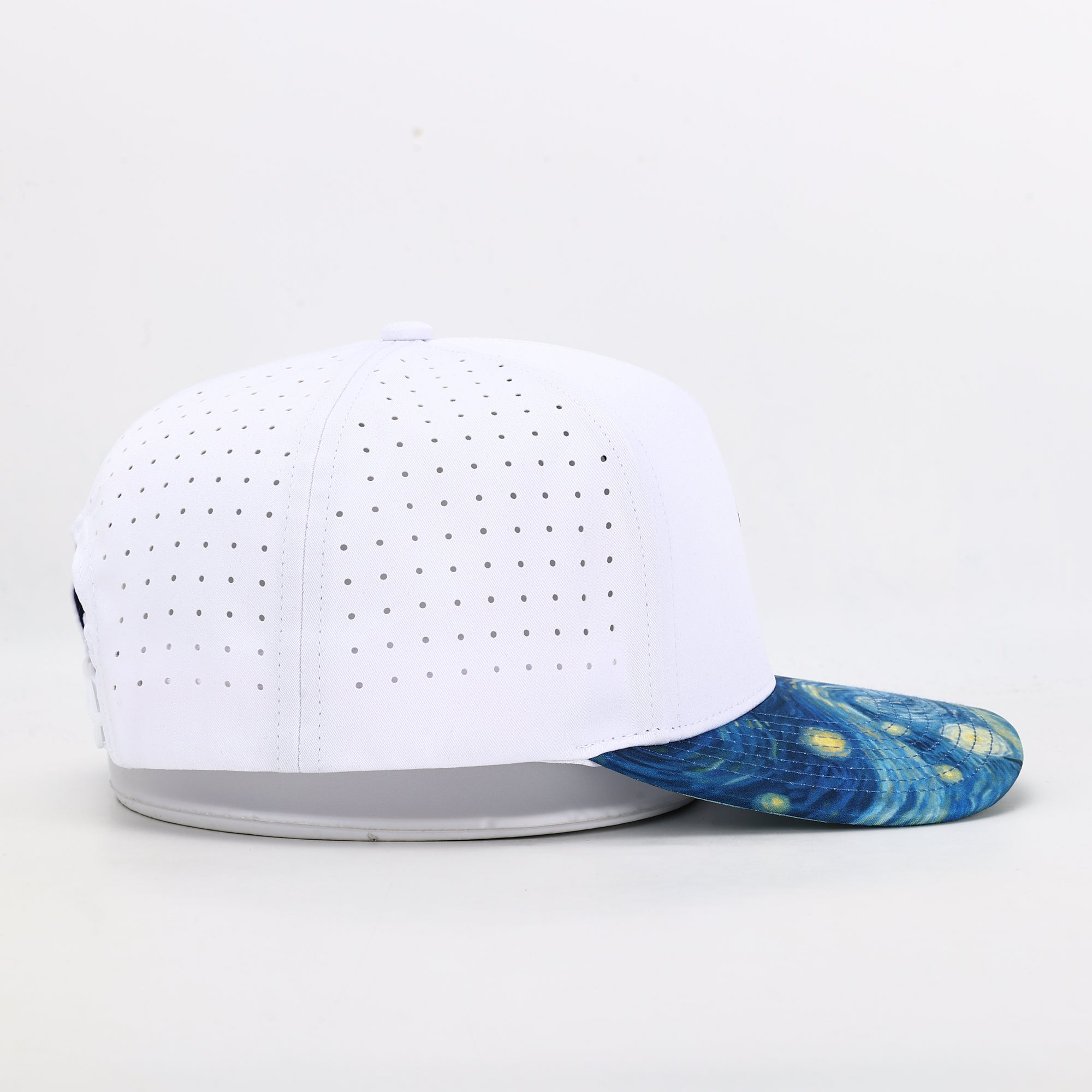 White cap with a blue and yellow pattern 