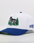 Cap with wolf design and text on a white background