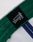 Close-up of a green belt with a black label featuring 'Our Friend Vinny' on a white background.