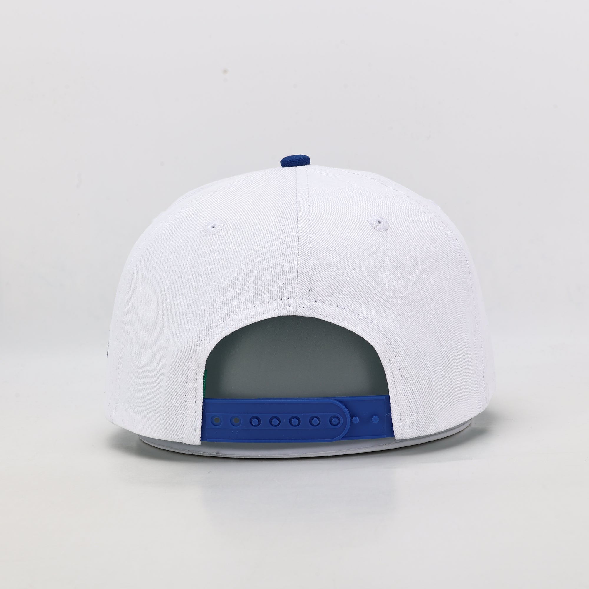 White cap with blue accents on a light gray background