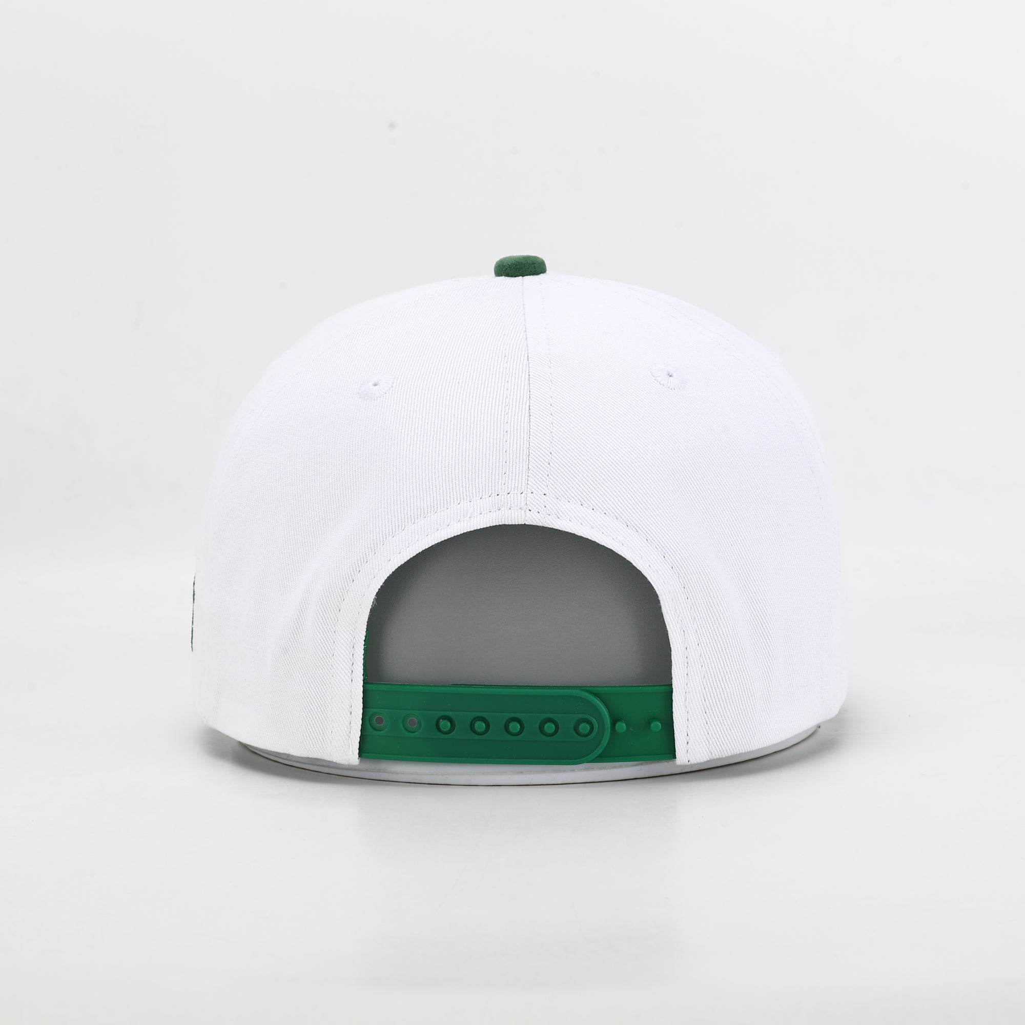 White cap with green accents on a white background