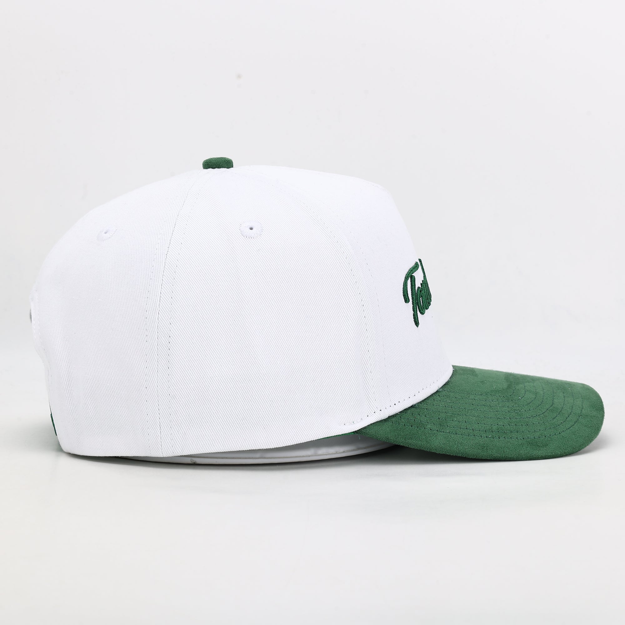 White and green baseball cap 