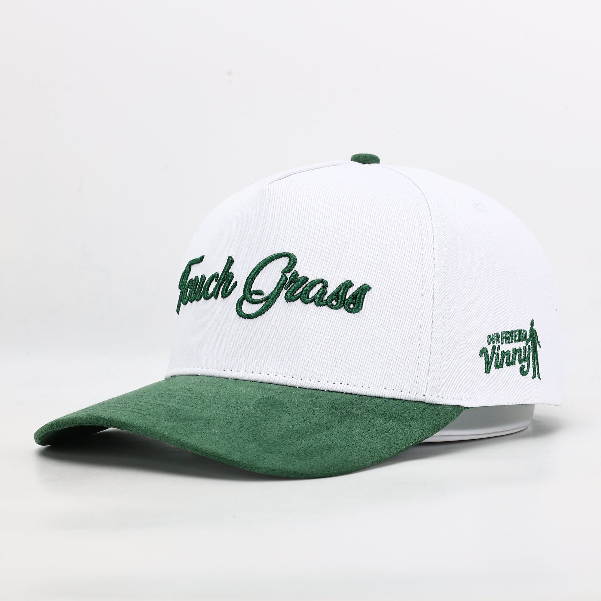 White and green cap with text on a white background