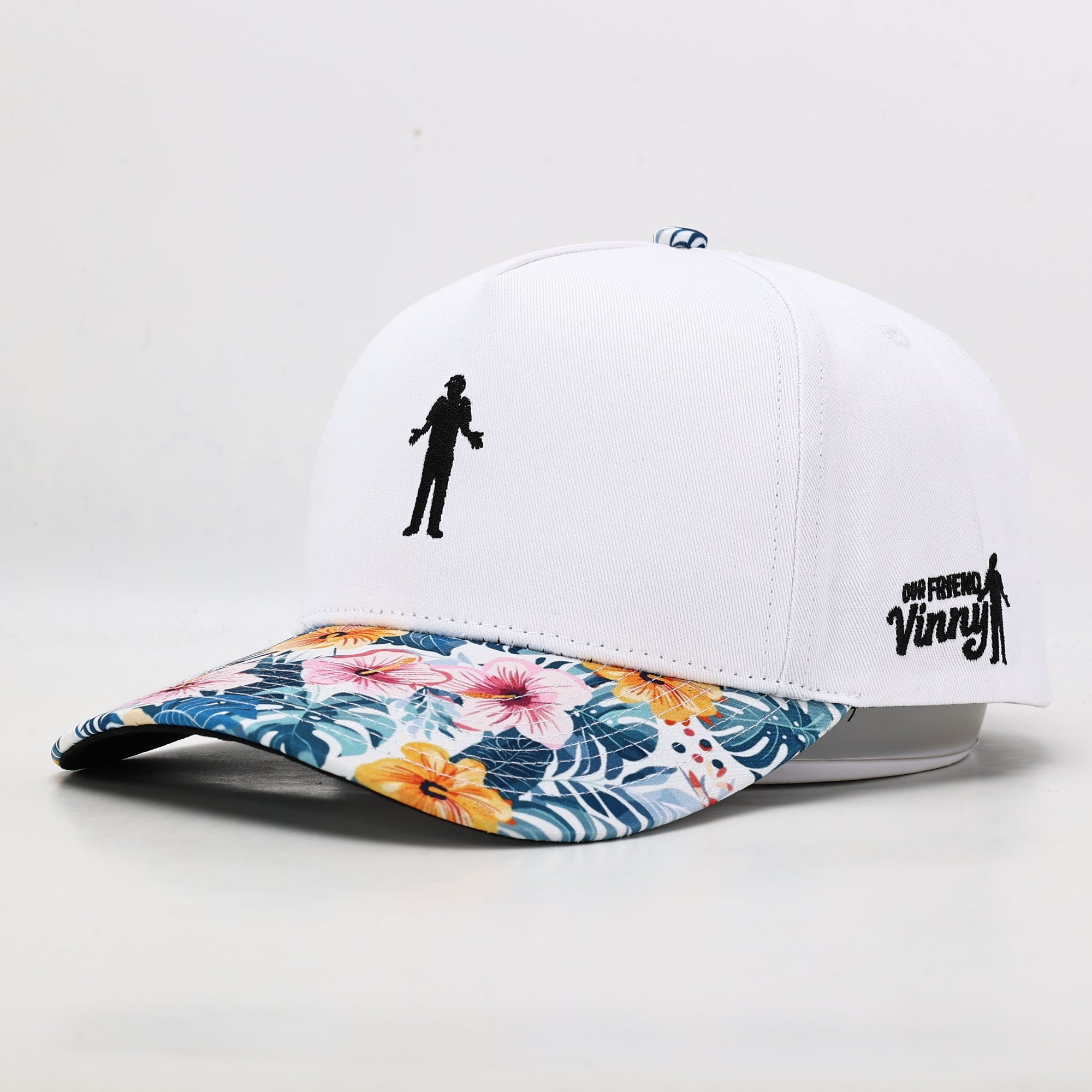White_golf_hat_with_floral_brim
