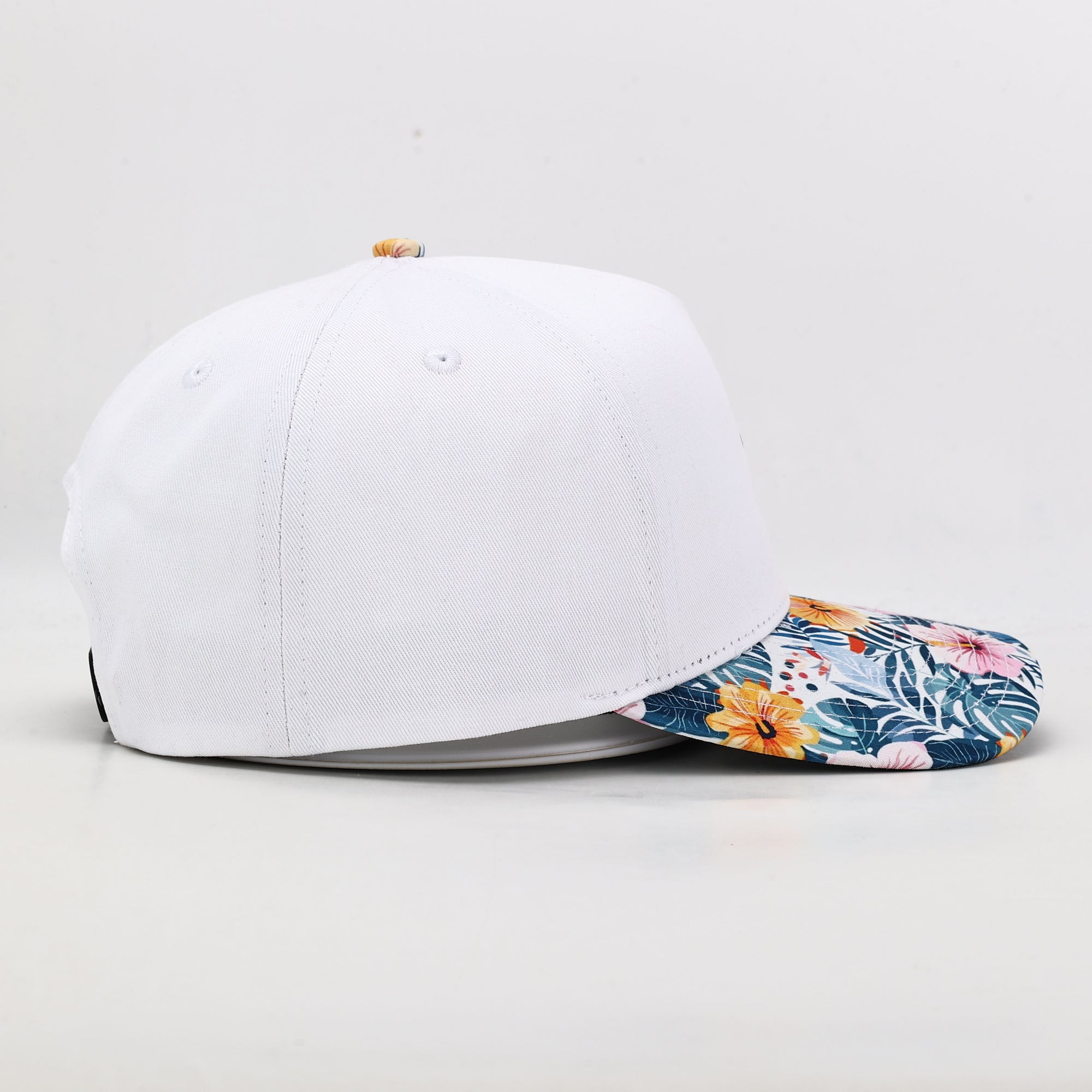 White golf hat with floral brim side 