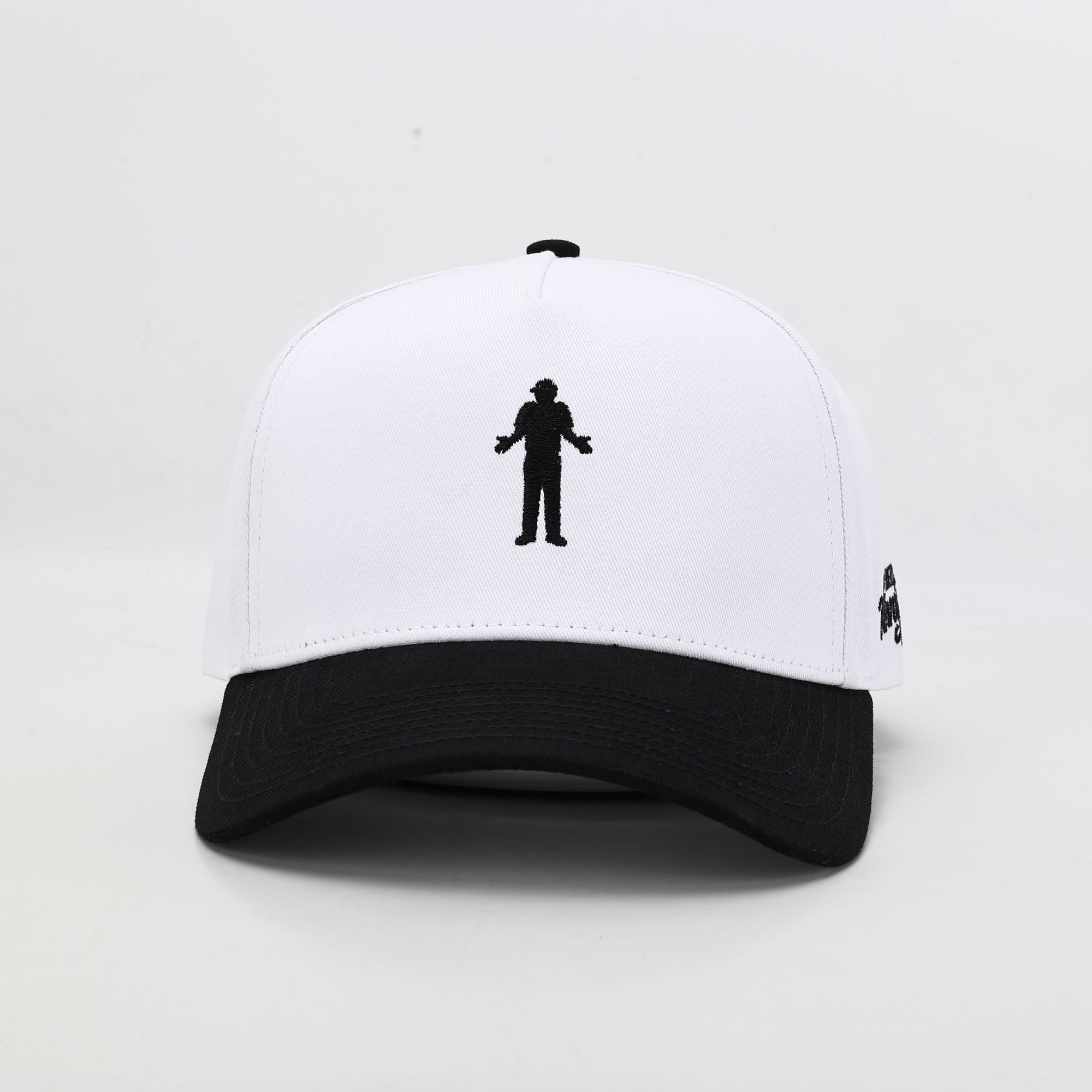 White golf cap with black brim front 