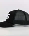 Black mesh cap with a logo on a light gray background