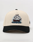 Beige Cap with embroidered ship design on a white background