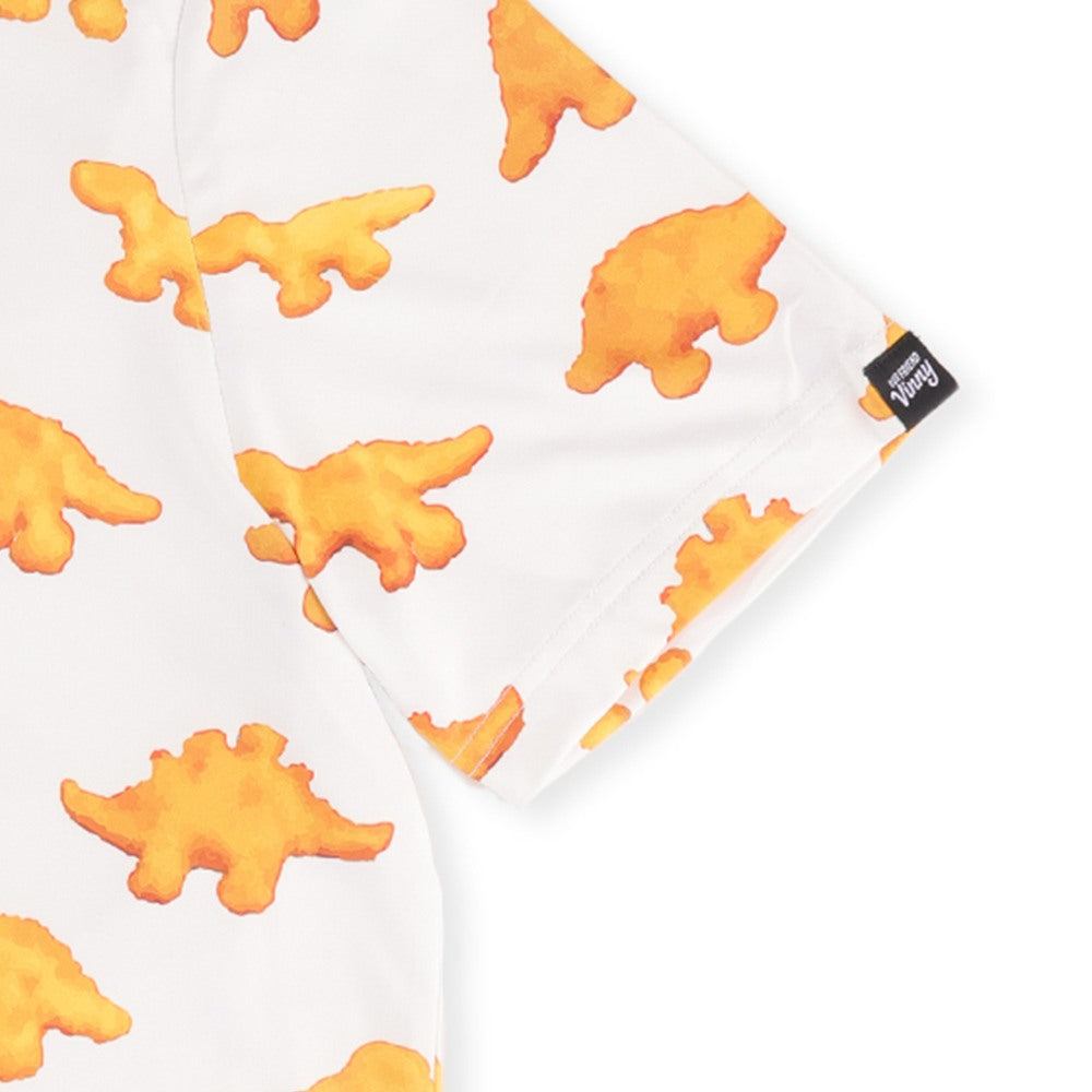 Close-up of the Our Friend Vinny tag on the sleeve of the Dino Nugget golf polo