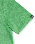 Close-up of the Our Friend Vinny tag on the sleeve of the Green Golf Topography Map golf polo