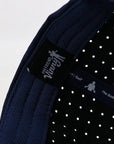 Navy blue cap with perforated design 