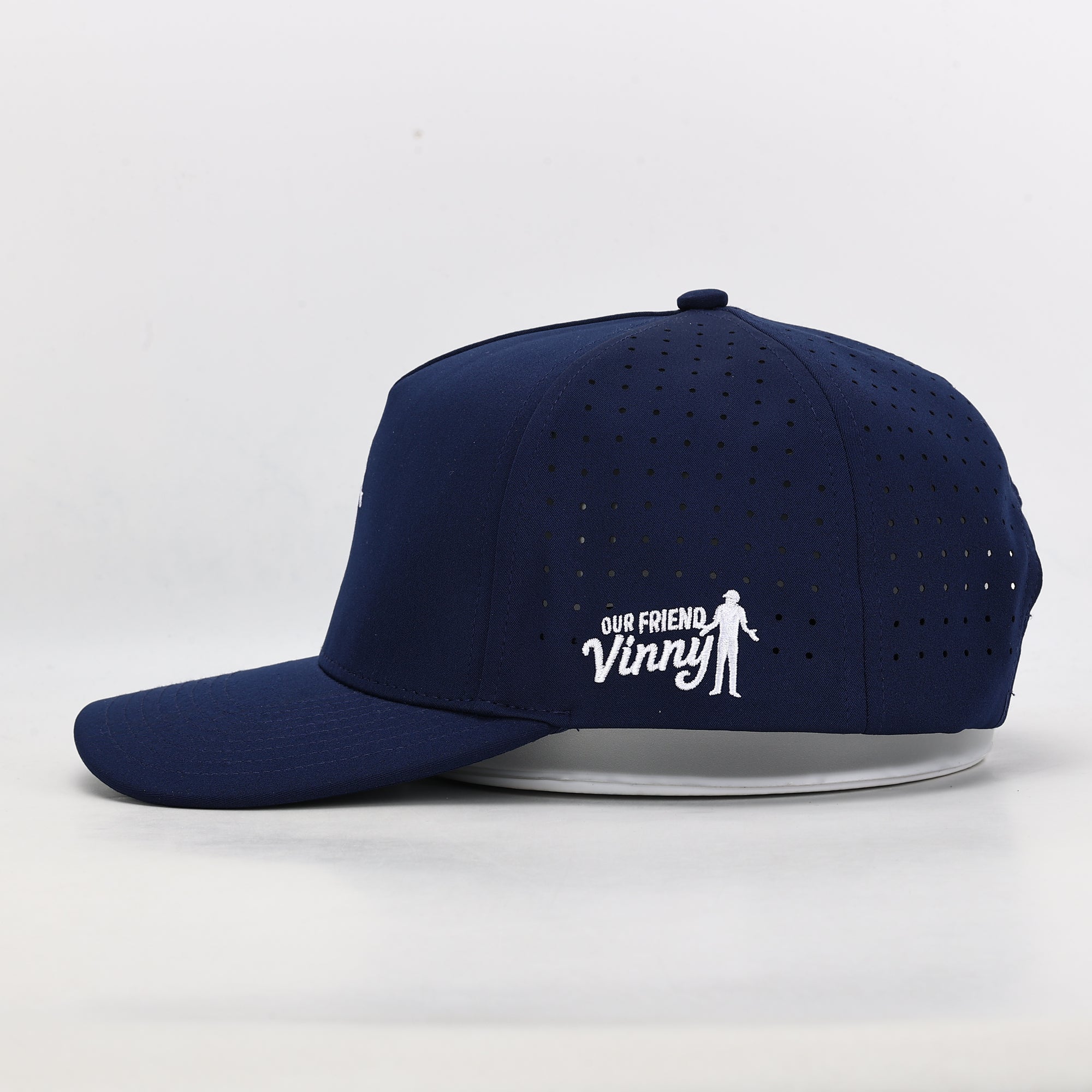 Navy blue cap with perforated design 