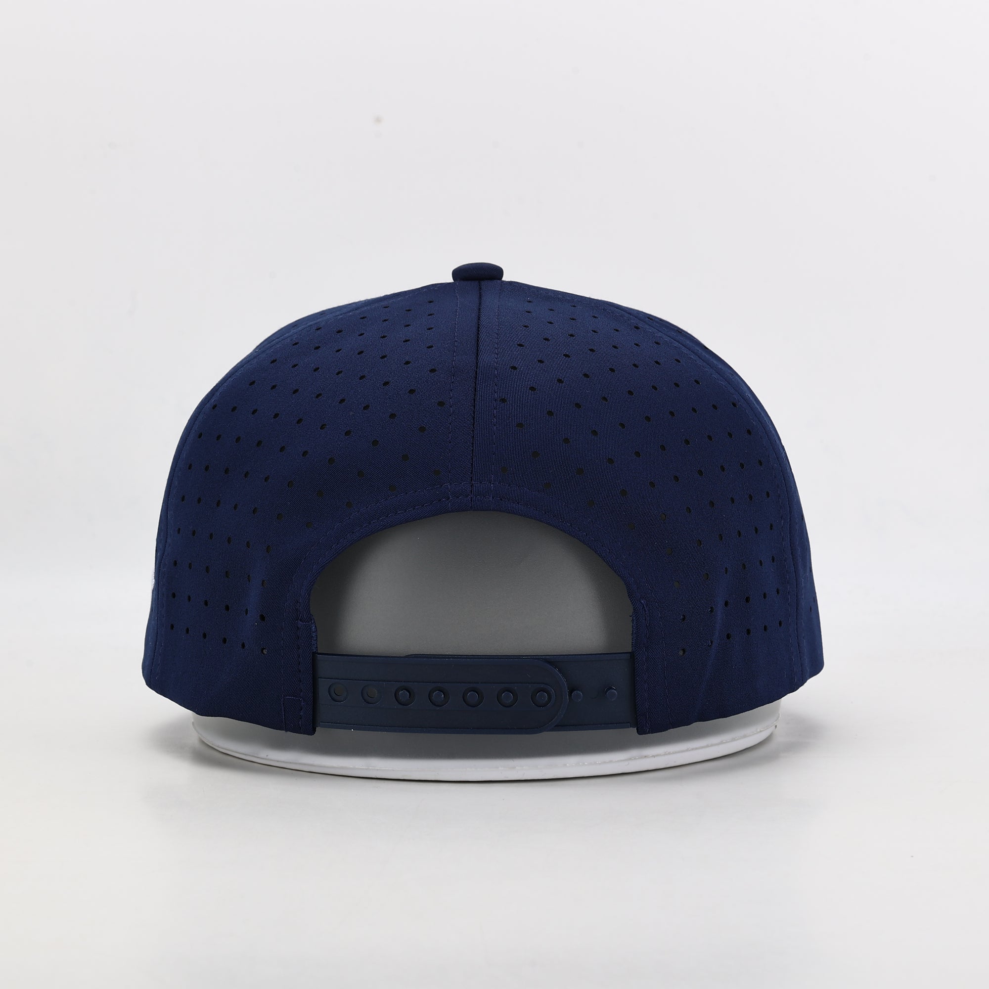 Navy blue cap with perforated design 