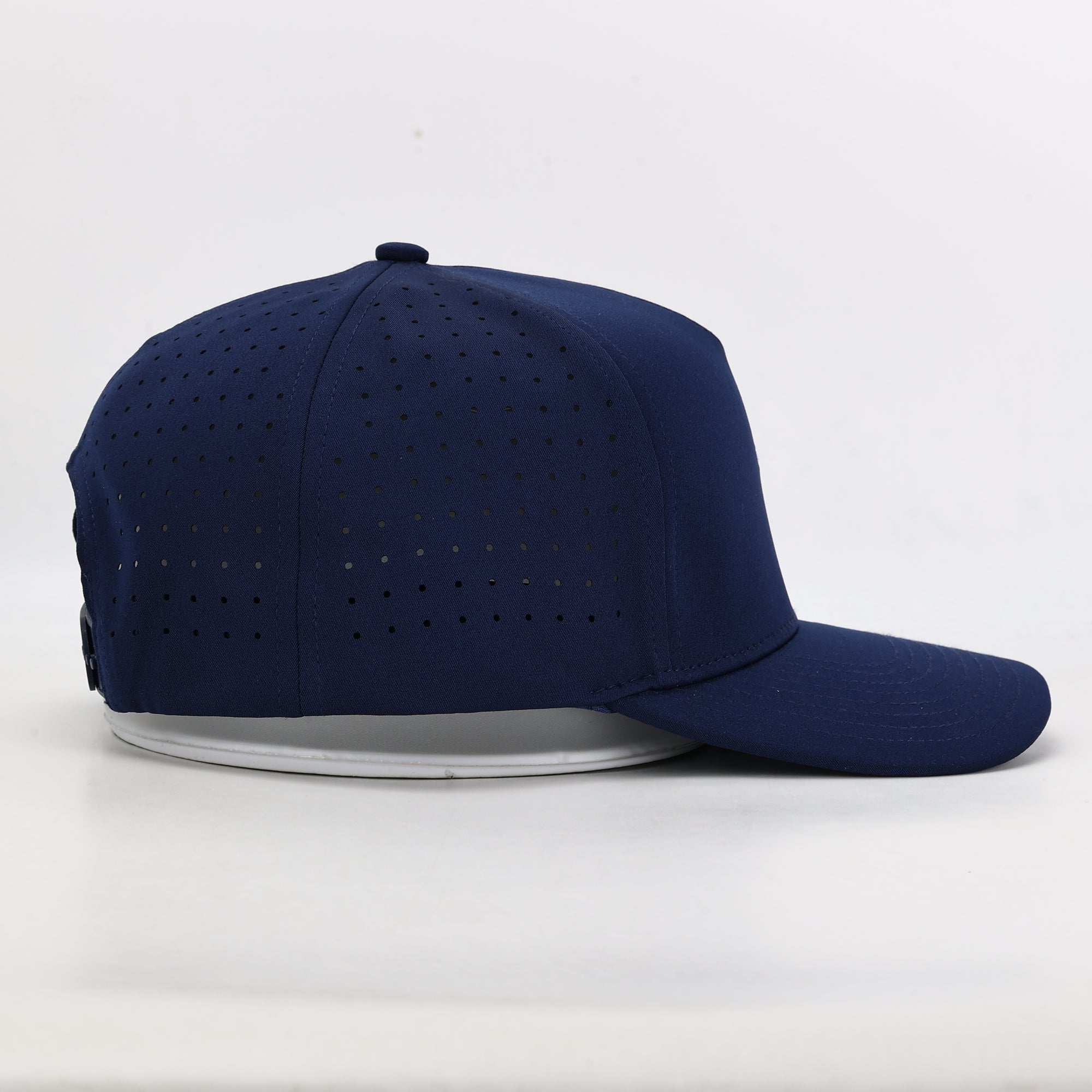 Navy blue cap with perforated design 
