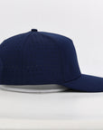 Navy blue cap with perforated design 
