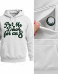 Put Me Down for an 8 golf hoodie front with close-ups of the embroidered golf ball hidden inside the front pocket