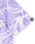 Close-up of the Our Friend Vinny tag on the sleeve of the Riptide golf polo