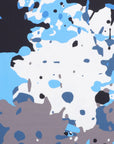 Pattern swatch of the Spilled Ink golf polo print